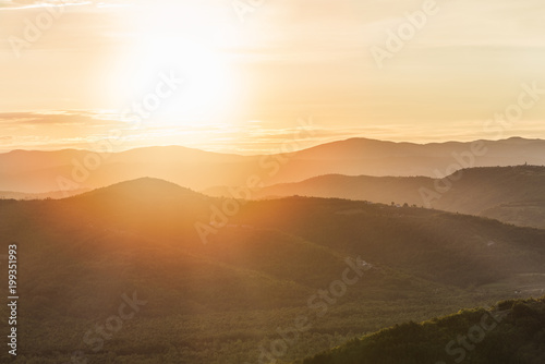 Summertime and sunrise above istrian landscape