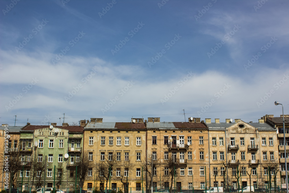 backstreet city view with buildings line and blue sky for copy space