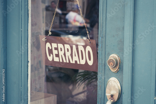 Cerrado (closed) sign on door - spanish word 