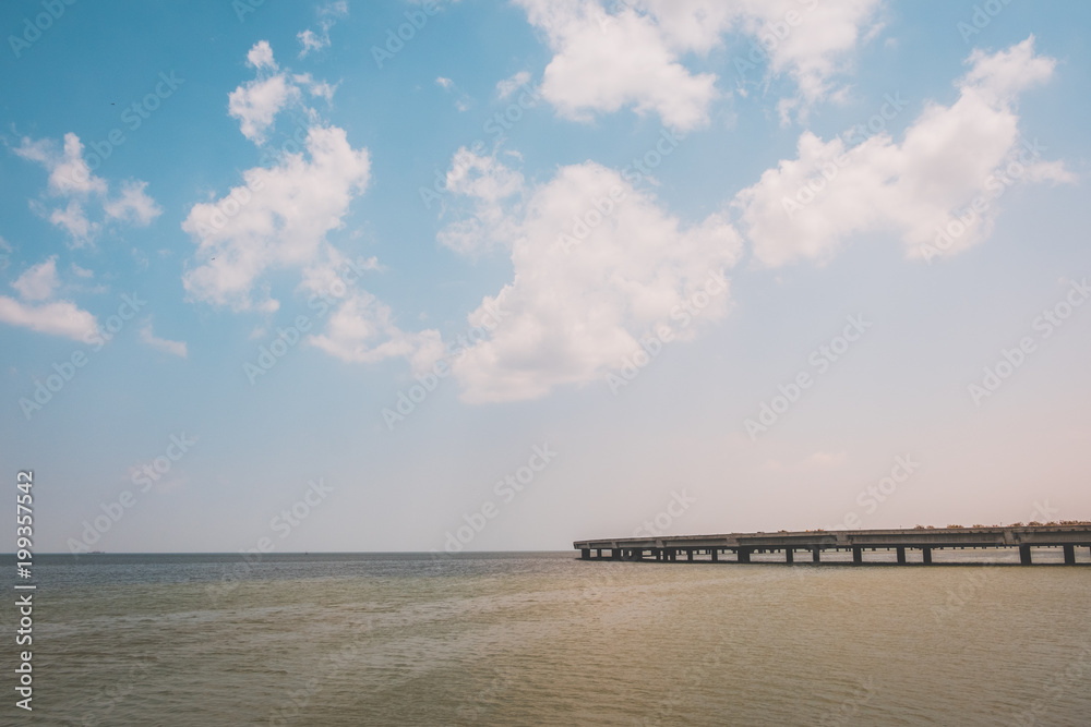 Fototapeta premium highway over ocean - road bridge over water , sky background