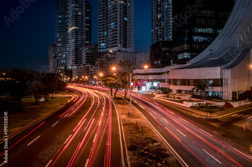 road traffic in modern city at night -  light trails, street traffic © hanohiki