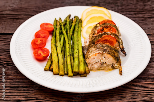 Roasted zander fillet with asparagus and lemon