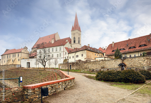 St. Nicholas Church and vineyard in front of it on a cloudy winter day. Town of Znojmo, Czech Republic, Moravia, Europe. photo