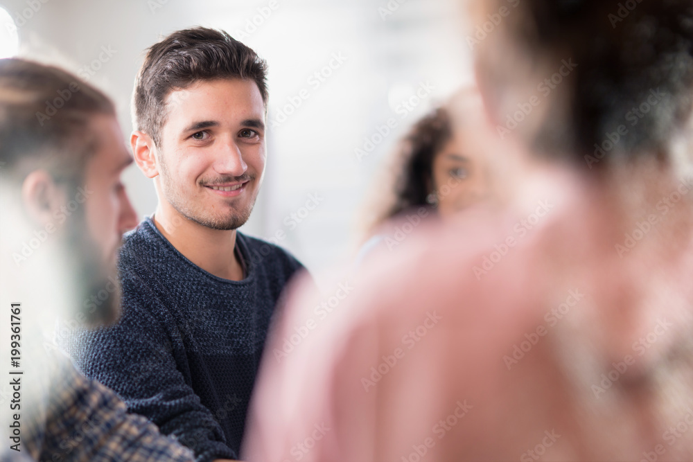 Meeting at the startup office . A working group meets to study a Meeting at the startup office . A working group meets to study a