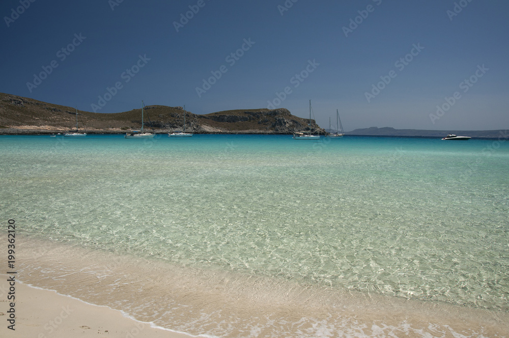 Crystal clear waters of exotic Simos beach at Elafonisos island in Greece