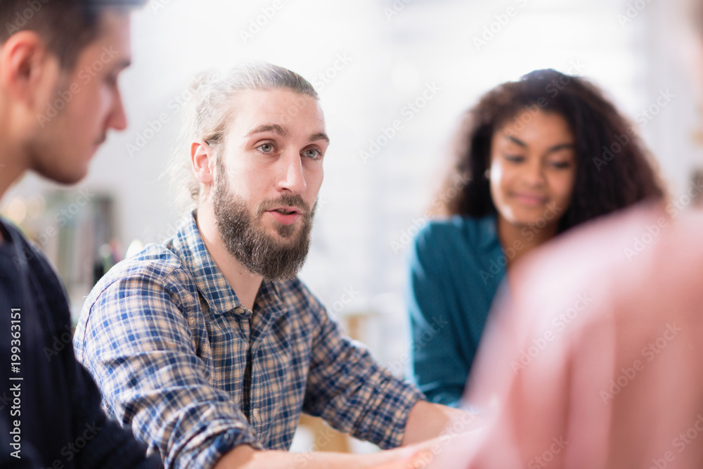 Meeting at the startup office . working group meets to study project Meeting at the startup office . working group meets to study project