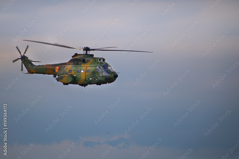 Fototapeta premium Military helicopter performing a demonstration flight