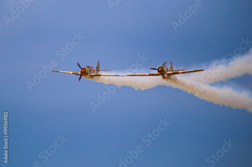 Aerobatics airplane performing a demonstration flight photo