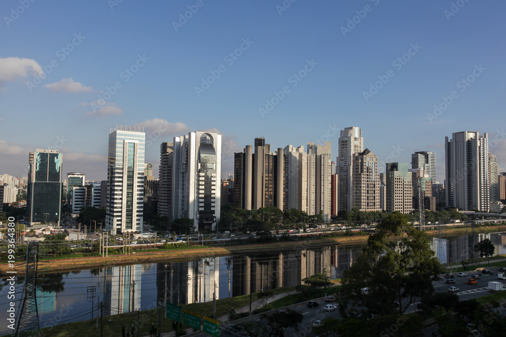 View of the Pinheiros River and corporate buildings in the city of Sao Paulo.