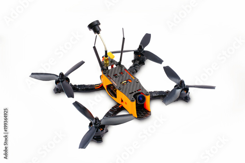 Fototapeta Naklejka Na Ścianę i Meble -  isolated drones racing FPV quadrocopter made of carbon black, drone ready for flight, stylish and modern hobby
