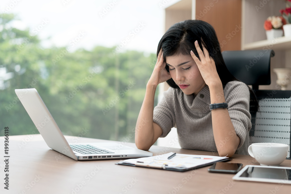 Portrait of tired young Asian business woman feeling stress from a lot of work. Stress at work and emotional pressure concept. Portrait of tired young Asian business woman feeling stress from a lot of work. Stress at work and emotional pressure concept.