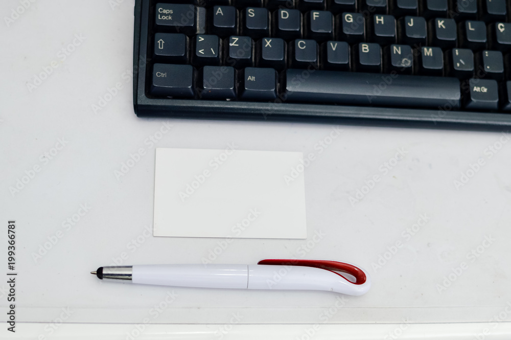 Mobile phone and computer keyboard on light table, communication technology background. Digital concept, gadgets support service, close up top view of electronic devices Mobile phone and computer keyboard on light table, communication technology background. Digital concept, gadgets support service, close up top view of electronic devices
