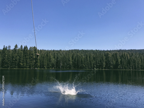 Scenic view of Rucker Lake against clear blue sky during sunny day photo