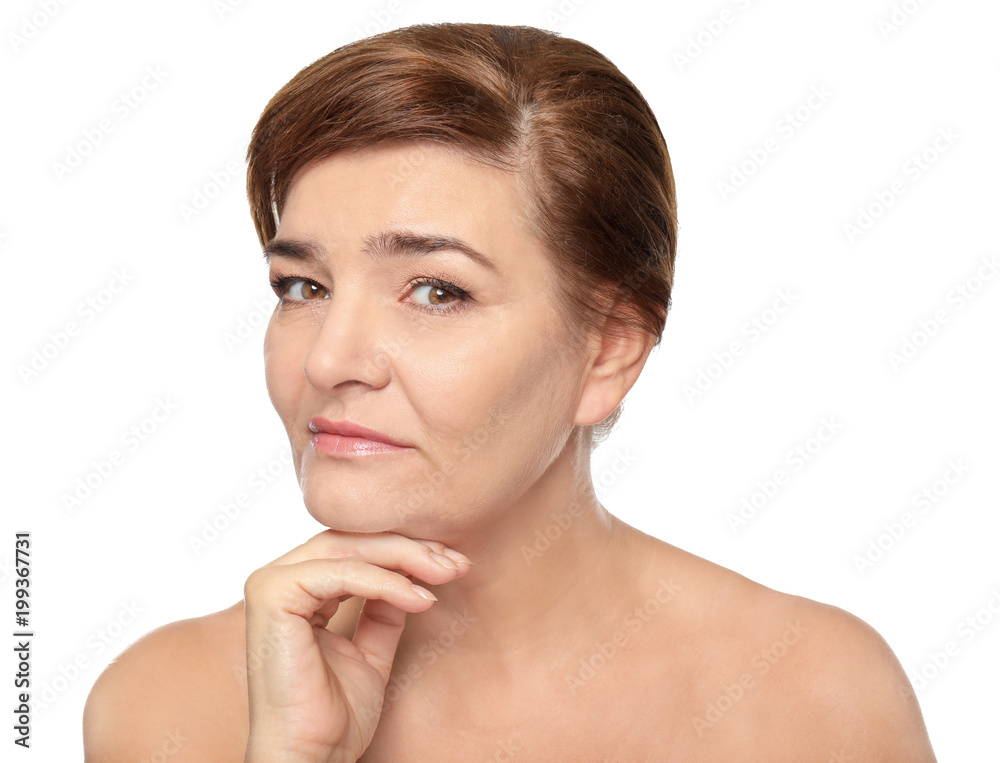Portrait of beautiful mature woman on white background. Skin care concept Portrait of beautiful mature woman on white background. Skin care concept