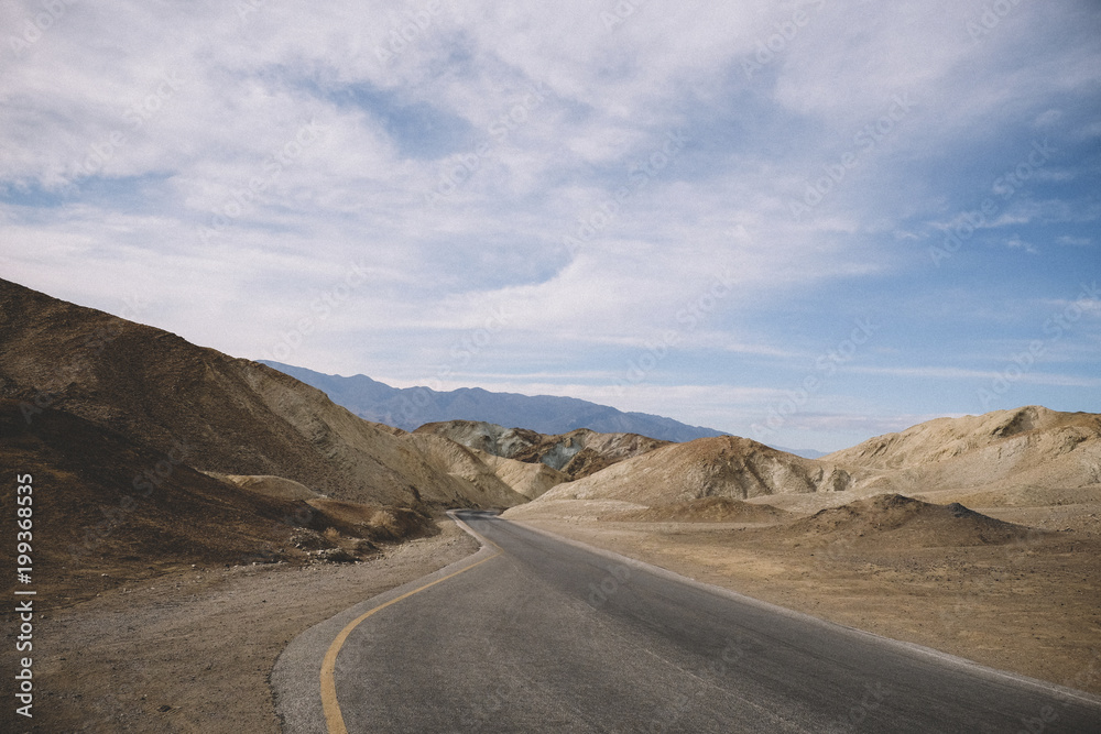 Empty road against sky at Death Valley National Park Empty road against sky at Death Valley National Park