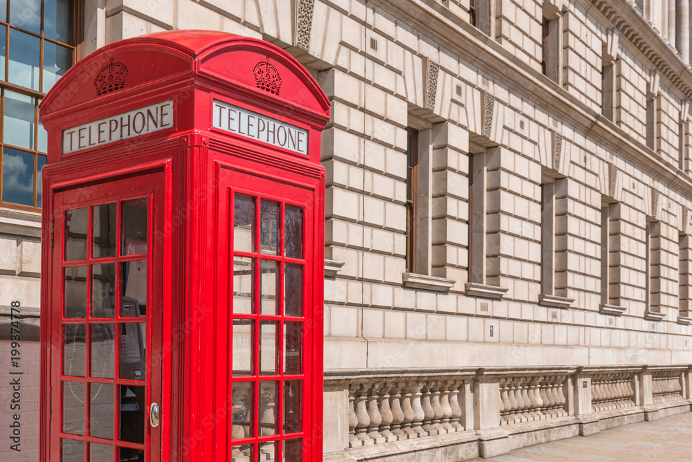 Telephone booth near the British Parliament in London Telephone booth near the British Parliament in London