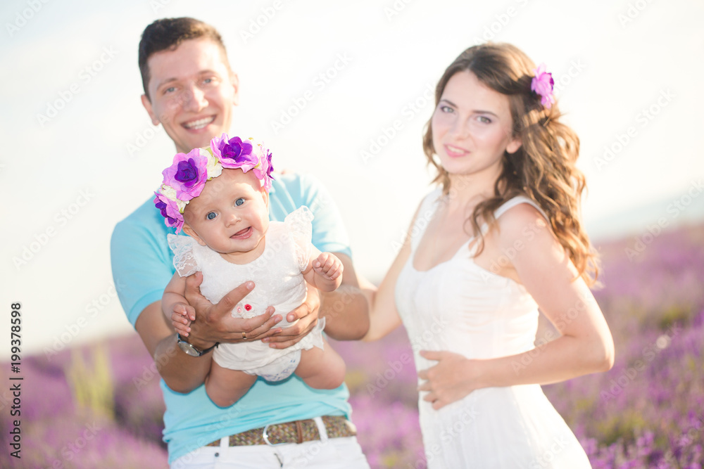 Young family in a lavender field Young family in a lavender field