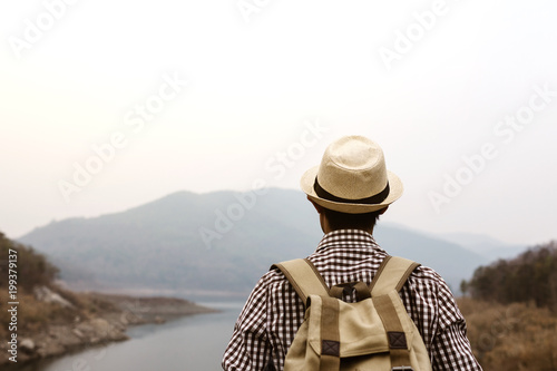 Young man tourist see view of mountain on bridge. © makibestphoto