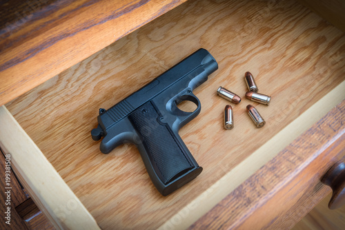 Handgun in Bedroom Dresser Drawer