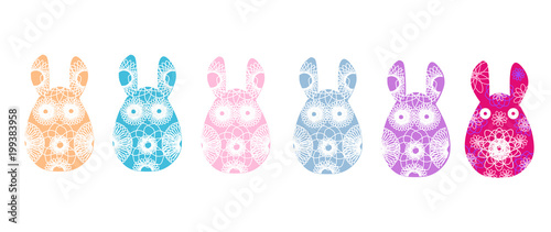 Set of rabbit silhouettes with a bright abstract pattern. Vector illustration isolated on white background. Unusual bunny for the Easter design and cards. © NatelaPancake