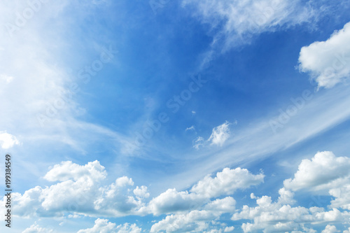 Beautiful fluffy clouds with blue sky background.