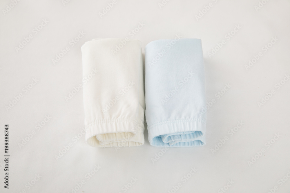 Fashion blue baby-girl shorts isolated on white background for spring and summer wardrobe/ Baby clothes/ Close-up/ Flat lay/ Top view Fashion blue baby-girl shorts isolated on white background for spring and summer wardrobe/ Baby clothes/ Close-up/ Flat lay/ Top view