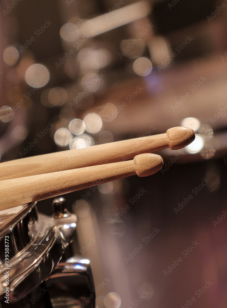 Naklejka premium Drums closeup and drum sticks