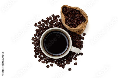 Top view  a cup of coffee and coffee beans in sack on white background.