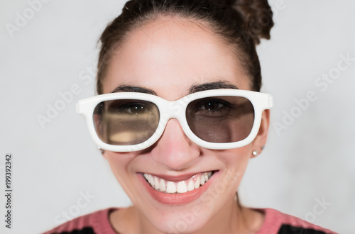 Giggly laughing face with 3d white eyeglasses