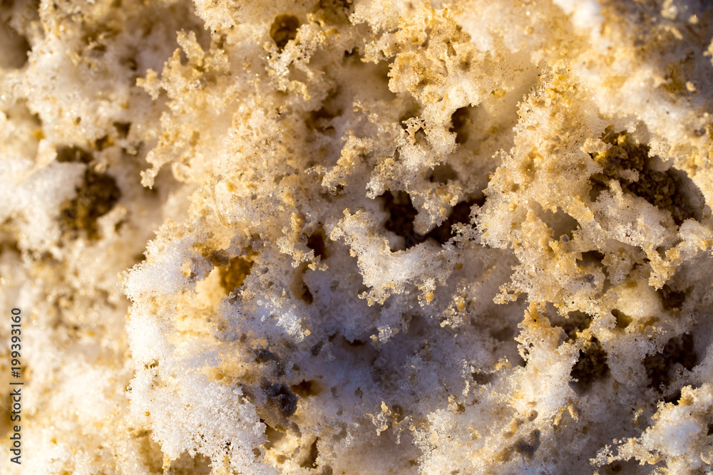 Snow with sand as an abstract background Snow with sand as an abstract background