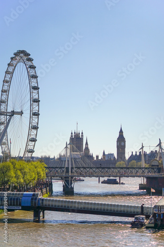 London, United Kingdom. April 9, 2017. London Landmark of The Eye with Many Tourist on The Sidewalk, The Westminster Bridge and The Festival Pier, Lambeth, London