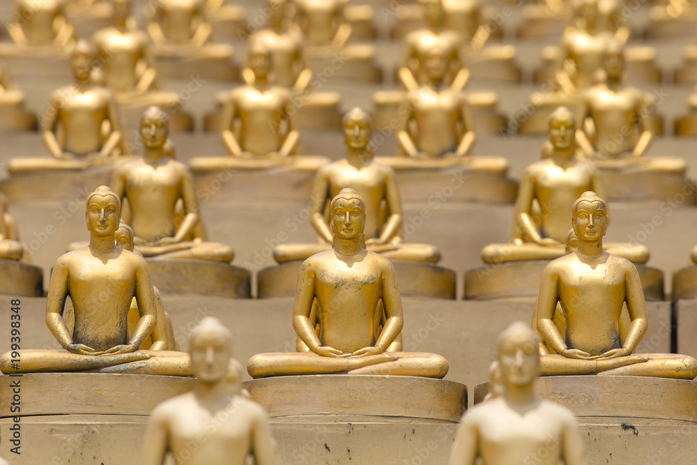 Million golden Buddha figurine in Wat Phra Dhammakaya. Buddhist temple in Bangkok, Thailand Million golden Buddha figurine in Wat Phra Dhammakaya. Buddhist temple in Bangkok, Thailand