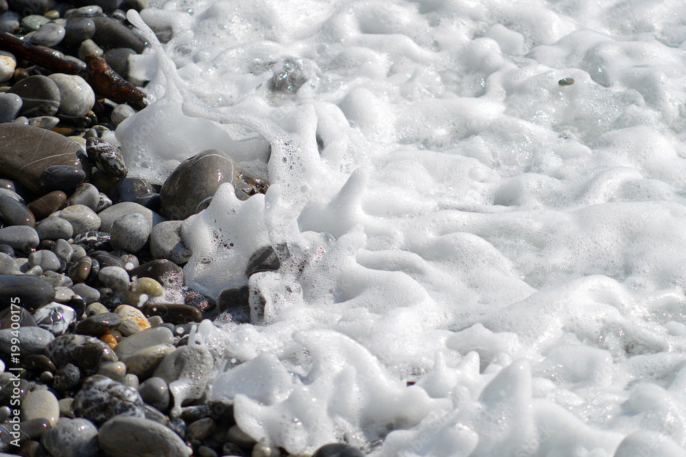 Foam on the stones. waves Foam on the stones. waves