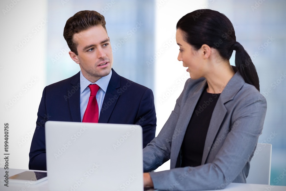 Composite image of business people interacting against white Composite image of business people interacting against white
