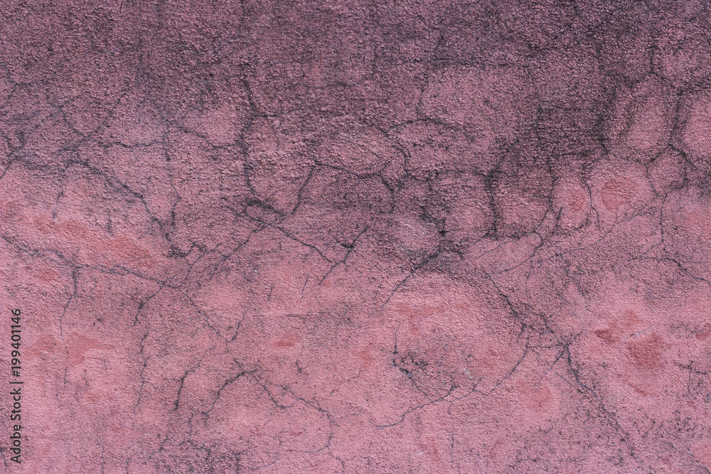 Faded pink plaster with cracks. Texture, background
