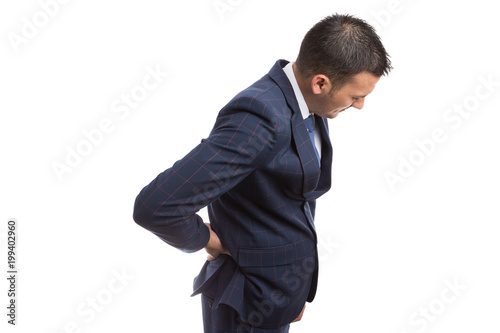 Accountant or banker suffering lower back pain.