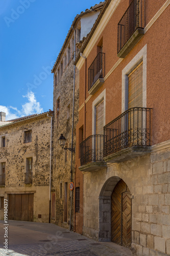 Beautiful old stone houses in Spanish ancient village Sant Feliu de Pallerols in Catalonia