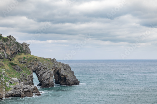 awesome cliffs with holes and caves on the rocks of the atlantic coastline. © Sergio de Flore