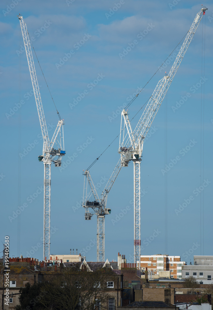 Cranes - Construction - Construction Site - Building. New Hospital under construction, Brighton, East Sussex, UK Cranes - Construction - Construction Site - Building. New Hospital under construction, Brighton, East Sussex, UK
