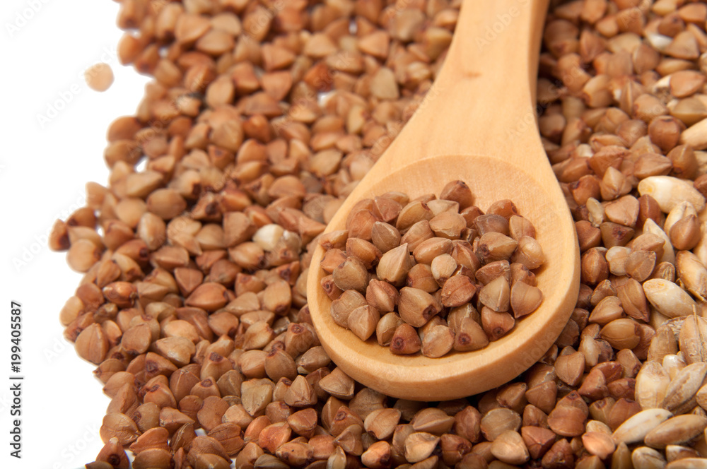 Wooden spoon with grain on the white Wooden spoon with grain on the white