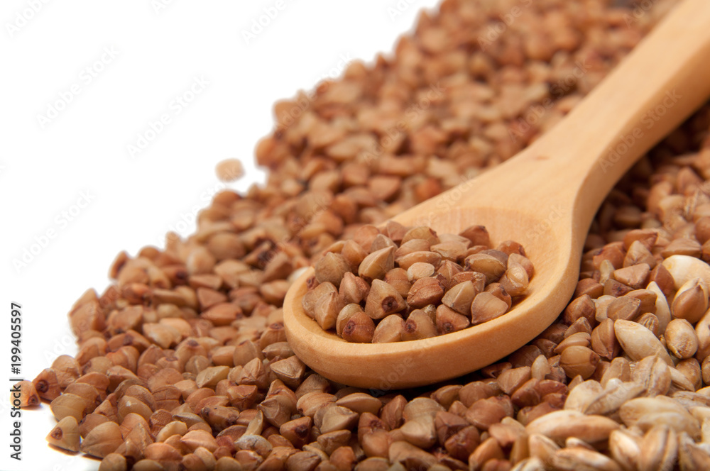 Wooden spoon with grain on the white Wooden spoon with grain on the white