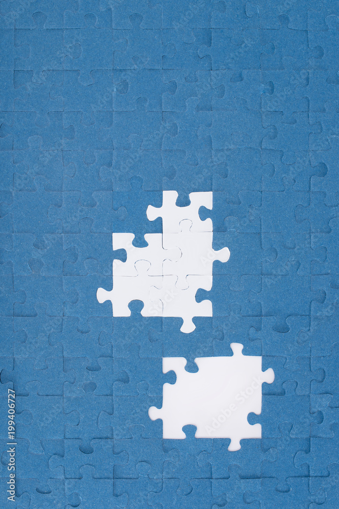 Fototapeta premium top view of puzzles with missing elements, business concept