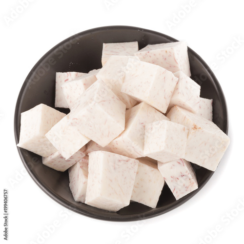 Black bowl of Cube taro root isolated on a white background