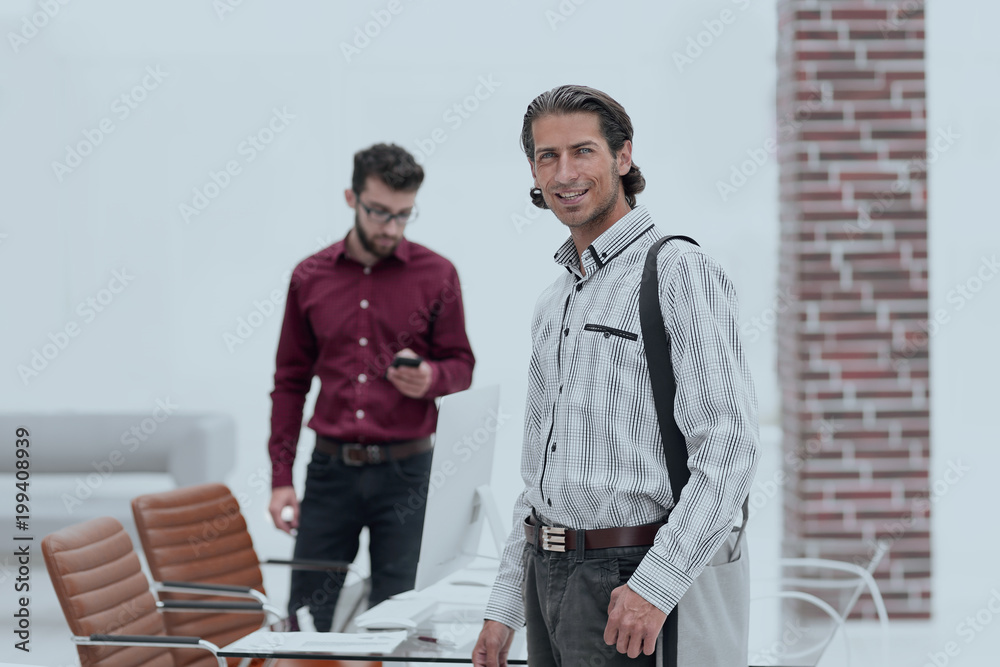 Fototapeta premium employees standing in a modern office
