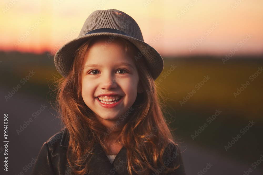 beautiful girl with hat on evening sunset beautiful girl with hat on evening sunset