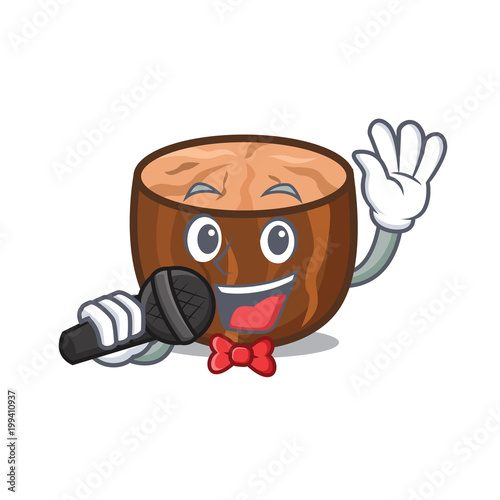 Singing nutmeg mascot cartoon style