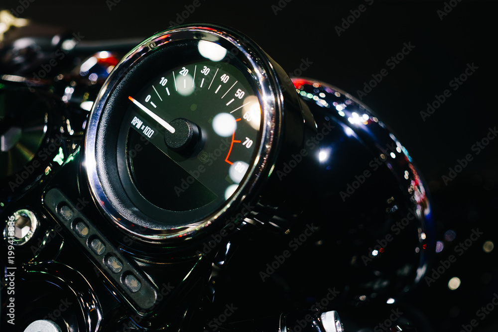 close up shot of motorcycle control panel with speedometer dashboard or speed meter close up shot of motorcycle control panel with speedometer dashboard or speed meter