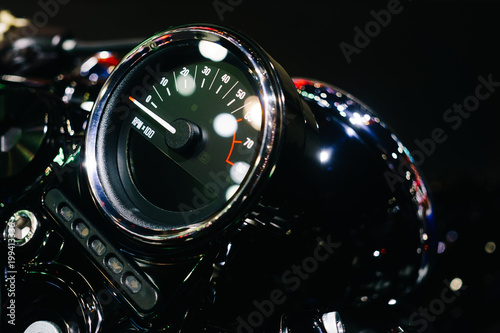 close up shot of motorcycle control panel  with speedometer dashboard or speed meter © ezstudiophoto