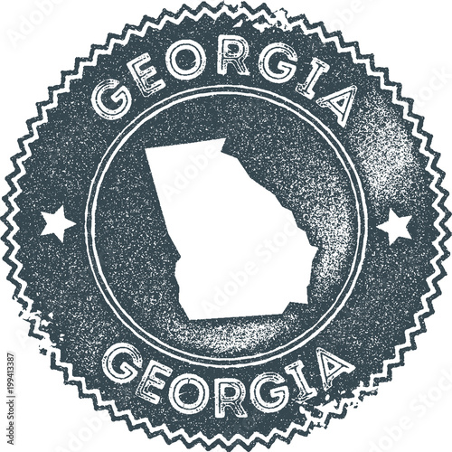 Georgia map vintage stamp. Retro style handmade label, badge or element for travel souvenirs. Dark blue rubber stamp with US state map silhouette. Vector illustration.