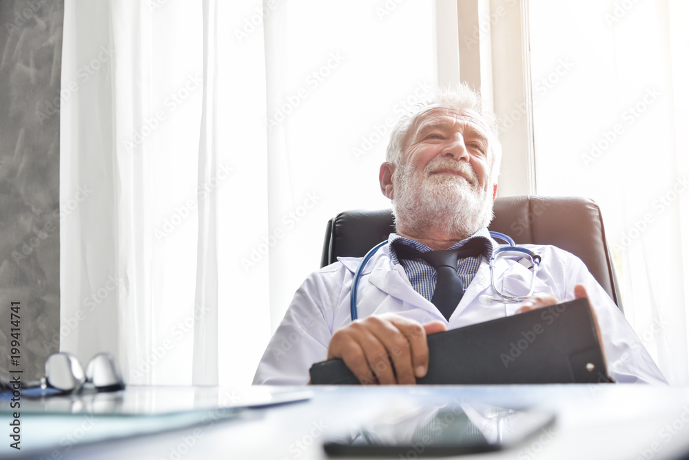 Happy Senior male Doctor is thinking. Happy Senior male Doctor is thinking.